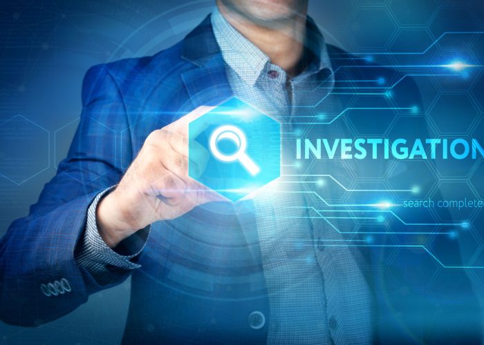 Business, internet, technology concept.
Businessman chooses Investigation button on a touch screen interface.