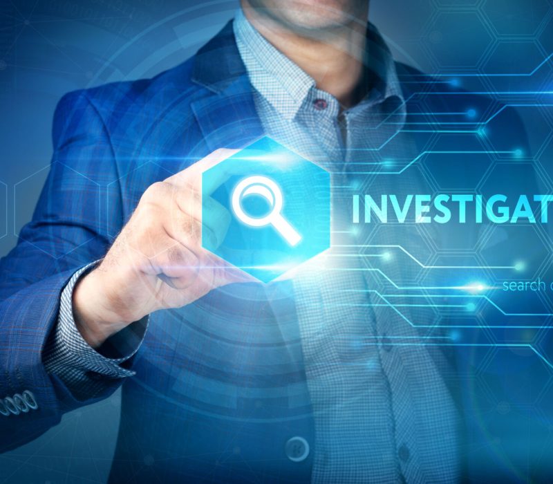 Business, internet, technology concept.
Businessman chooses Investigation button on a touch screen interface.